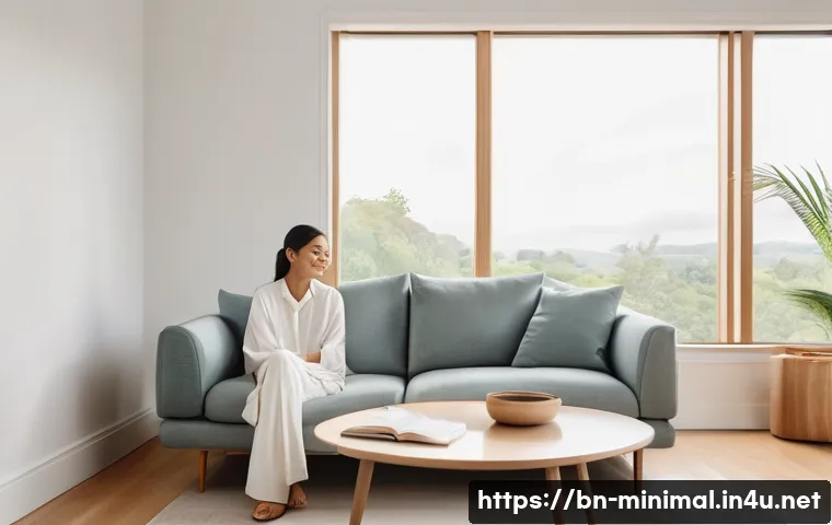 미니멀라이프 정신 건강 - **A Serene Minimalist Sanctuary:** A bright, airy living room with large windows letting in abundant...